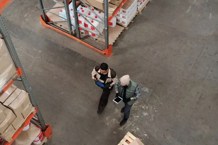 Worker recording time against a task on the shop floor
