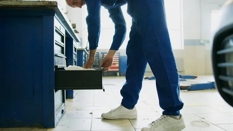Supervisor checking live job status on the workshop floor