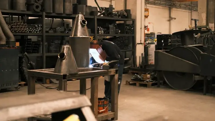 Metal fabrication workshop with welding and fabrication work